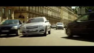 cars driving on busy European street — Lucy