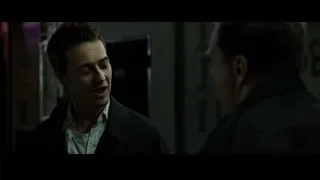 Two men conversing in dim room — Fight Club