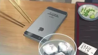 iPhone next to plate of food on table — Weathering with You