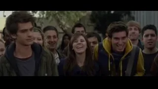 Young people in green jacket standing in line — The Amazing Spider Man