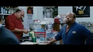man explaining with green onions in store — The Persuit of Happyness