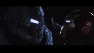 robot face with glowing blue eyes — Iron Man