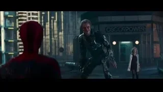 man in futuristic suit holding gun — The Amazing Spider Man 2