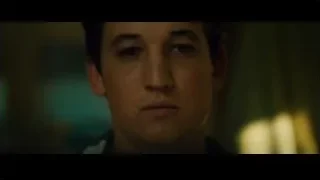 Young man with serious expression in dimly lit room — Whiplash