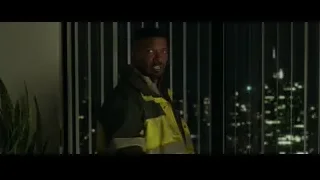 man in yellow jacket looking at city night — Spiderman: No Way Home