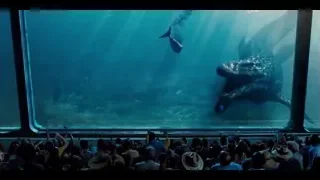 people watching humpback whale in aquarium — Jurassic World