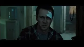 Young man with bandage on forehead in dimly lit room — Fight Club
