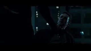 Distressed man in dimly lit room with cityscape — Fight Club