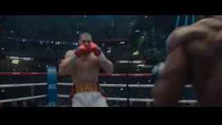 boxer throwing punch in boxing ring — Creed 2