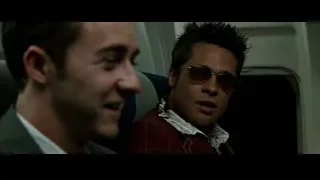 two men sitting in airplane — Fight Club