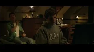 Two young men looking at computer — The Social Network