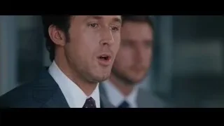 two men conversing in an office — The Big Short