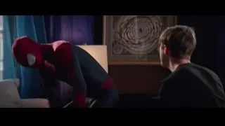 Spiderman standing in room with window — The Amazing Spider Man 2