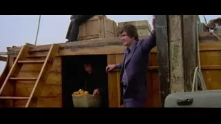 two men on boat holding oranges — Bruce Lee: Enter The Dragon