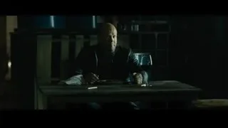 bald man eating wine in dim room — Furious Seven