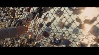 hand reaching for colorful padlocks on fence — Now You See Me
