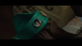 green leather championship belt with badges — Creed 2