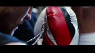 man's face looking serious — Southpaw