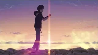 young man on rocky beach at sunset — Your Name