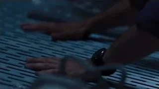 Person holding white sphere in the dark — The Avengers