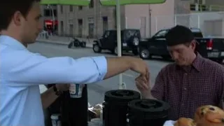 Man in suit drinking soda on street — Suits