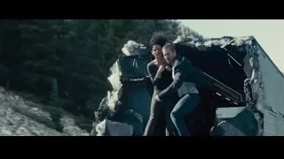 man and woman standing in rubble — Furious Seven