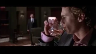 Young man in suit in dimly lit room — Spider Man 2
