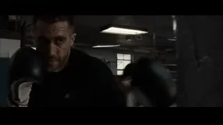 man sparring in dimly lit boxing gym — Southpaw