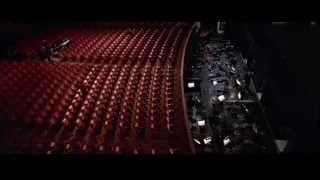 empty auditorium with red seats — Steve Jobs