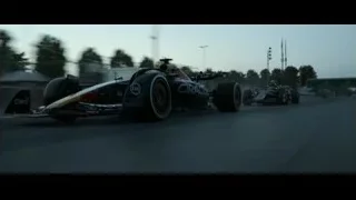 Formula One car on track at dusk — F1