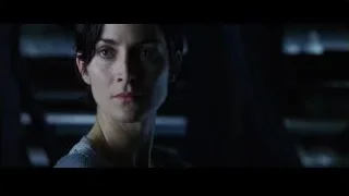 woman with dark hair serious expression — The Matrix