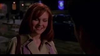 woman talking to man on street — Spider Man