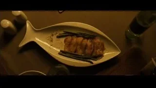 Grilled fish fillet on fish-shaped plate — Whiplash