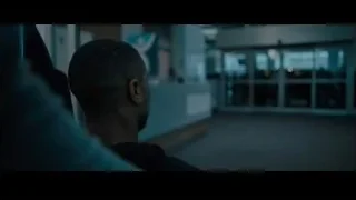 Man and woman walking in airport terminal — Creed 2