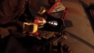 Person working with power drill on a bench — Breaking Bad