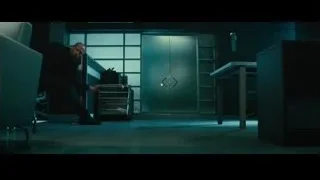 bald man with gun in dark room — Furious Seven