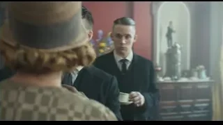 man and woman conversing in red room — Peaky Blinders