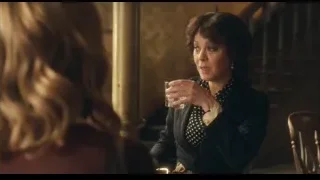 Woman in dim room by staircase — Peaky Blinders