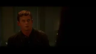 young man in leather jacket in dimly lit room — Bruce Lee: Birth of The Dragon