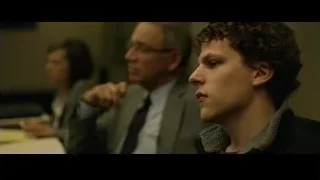Young man in conference room deep in thought — The Social Network