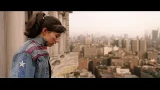 woman on balcony watching Superman fly — Doctor Strange 2