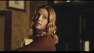 young woman in maroon blouse deep in thought — Peaky Blinders
