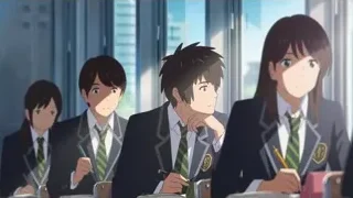 Students in uniform sitting in classroom — Your Name