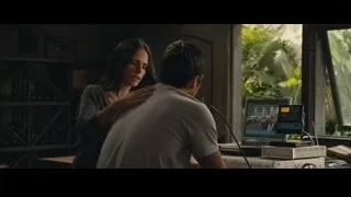 woman comforting man at computer desk — Furious Seven