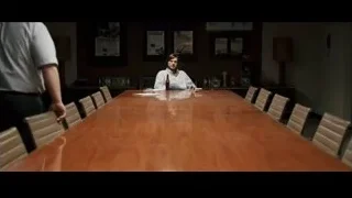 Man in white shirt at conference table — Jobs