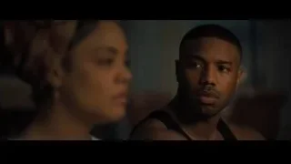 man and woman in dimly lit room — Creed 2