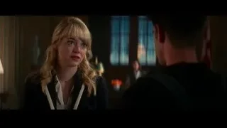 Woman and man in dimly lit room — The Amazing Spider Man 2