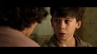 woman and young boy in floral room — Hacksaw Ridge