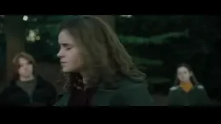 three young people walking in forest, man with gun — Harry Potter and the Goblet of Fire