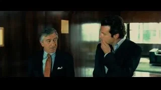 two men standing in elevator — Limitless